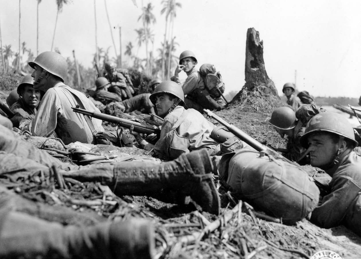 Troops pinned down on beach on Leyte Island, Philippine Islands, by Japanese mortar and machine gun fire, October 20, 1944 (National
Archives and Records Administration/U.S. Army Signal Corps)
